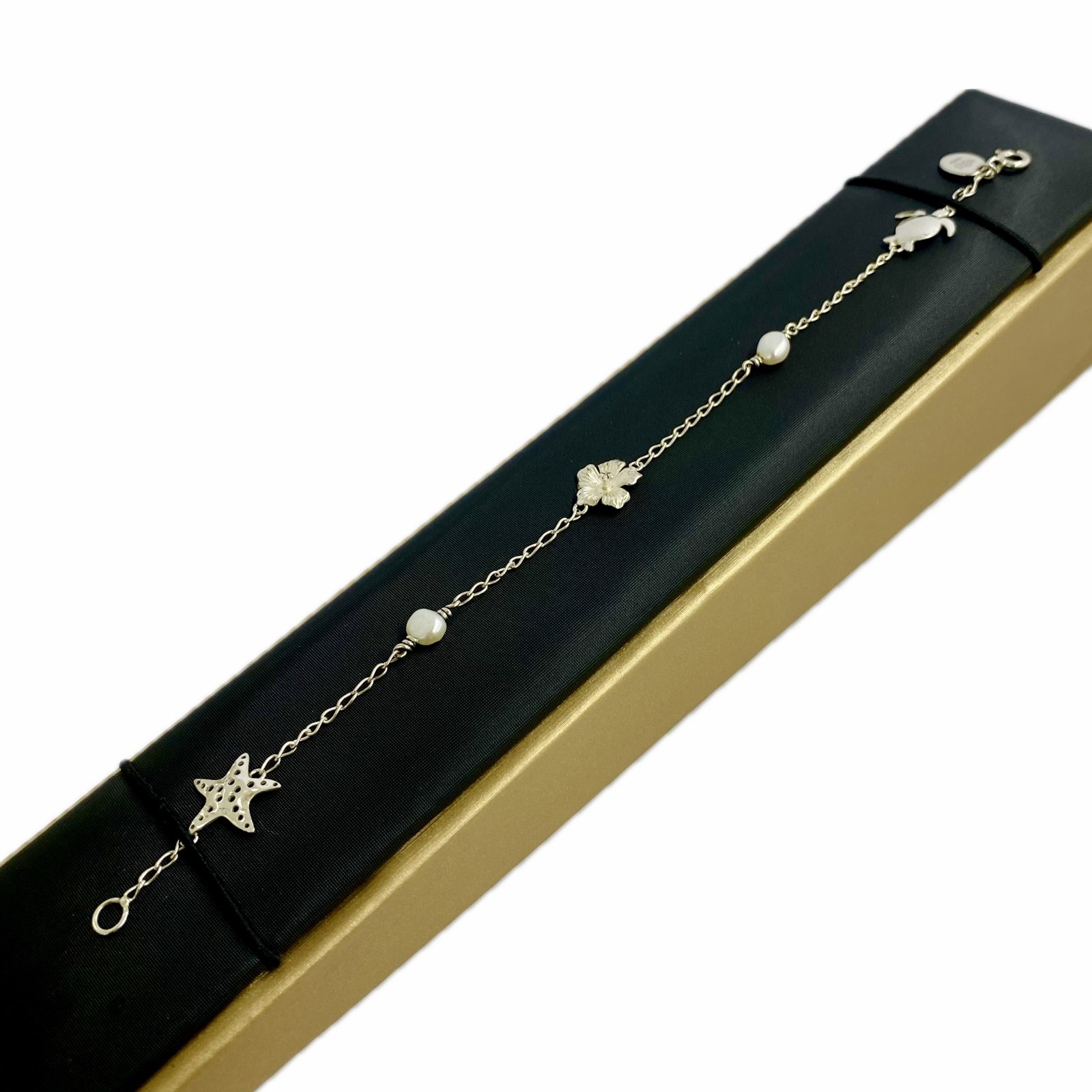 Bracelet with Turtle, Starfish and Mini Hibiscus charms with Freshwater pearls In Sterling Silver (925)